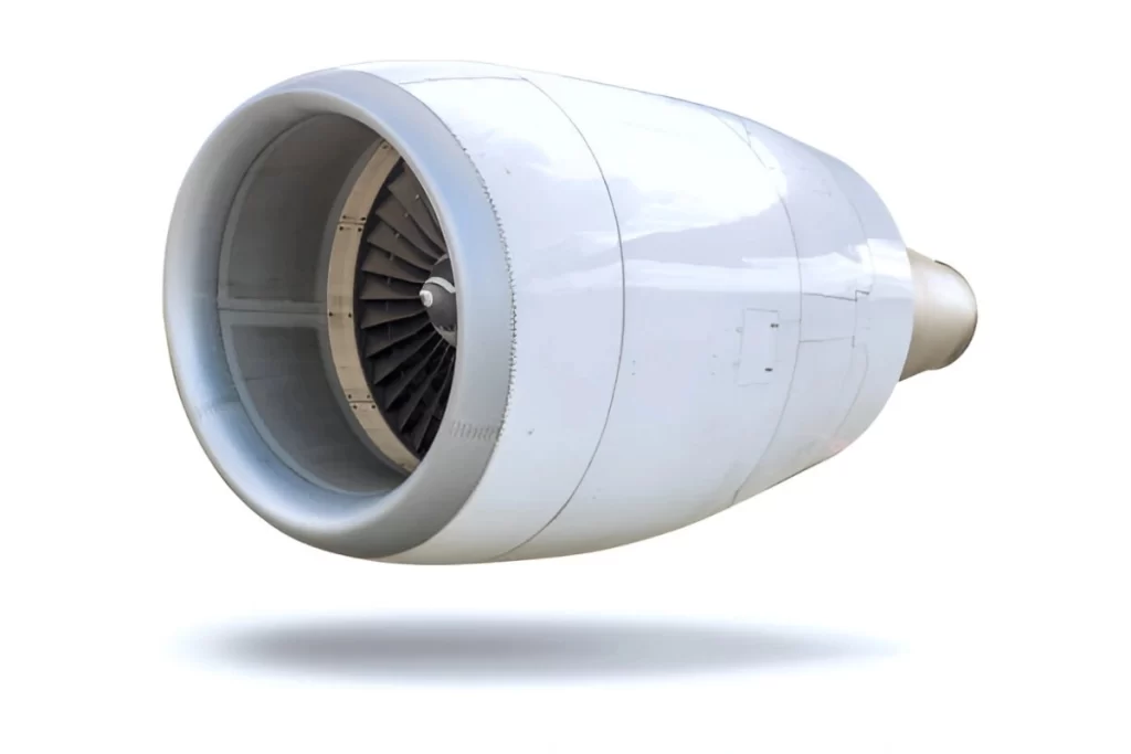 Alt Text: An image showing an aircraft turbine component made from 2024 aluminum. The part features intricate machining with smooth surfaces and precise detailing.