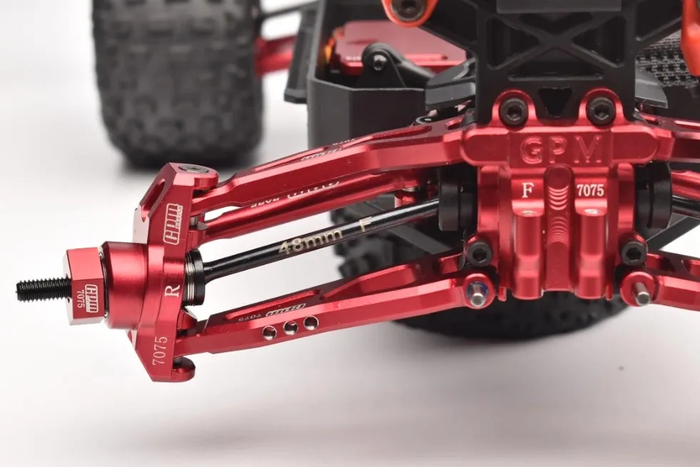 An off-road vehicle’s 4140 steel drive shaft and suspension arms.