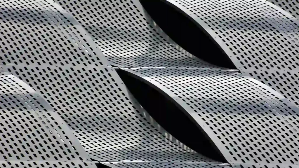 Wavy perforated aluminum sheet metal panels.