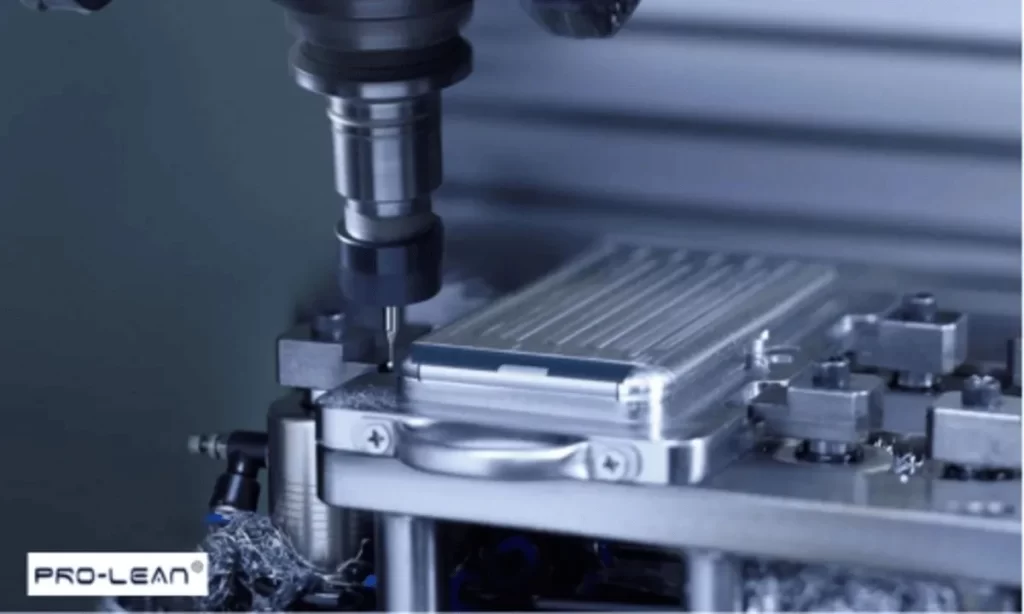 Close-up of a CNC machine drilling a metal part, highlighting precision manufacturing.