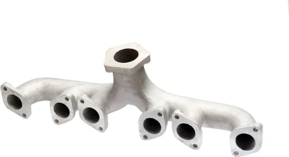 An image of a cast aluminum exhaust manifold with a smooth finish