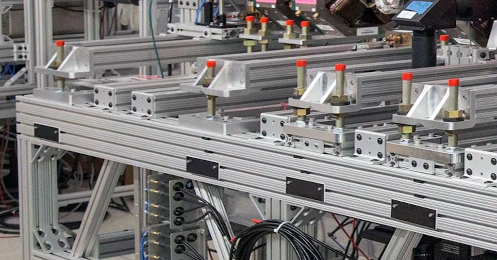 A close-up view of an automated workbench made with 8020 aluminum extrusion profiles