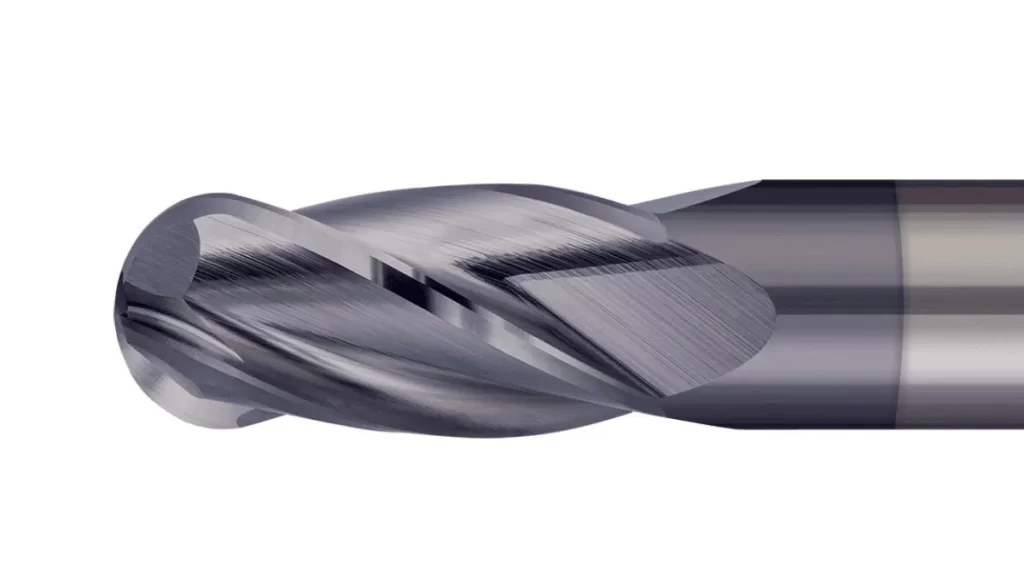 Close-up image of a ball end mill with a rounded cutting tip.