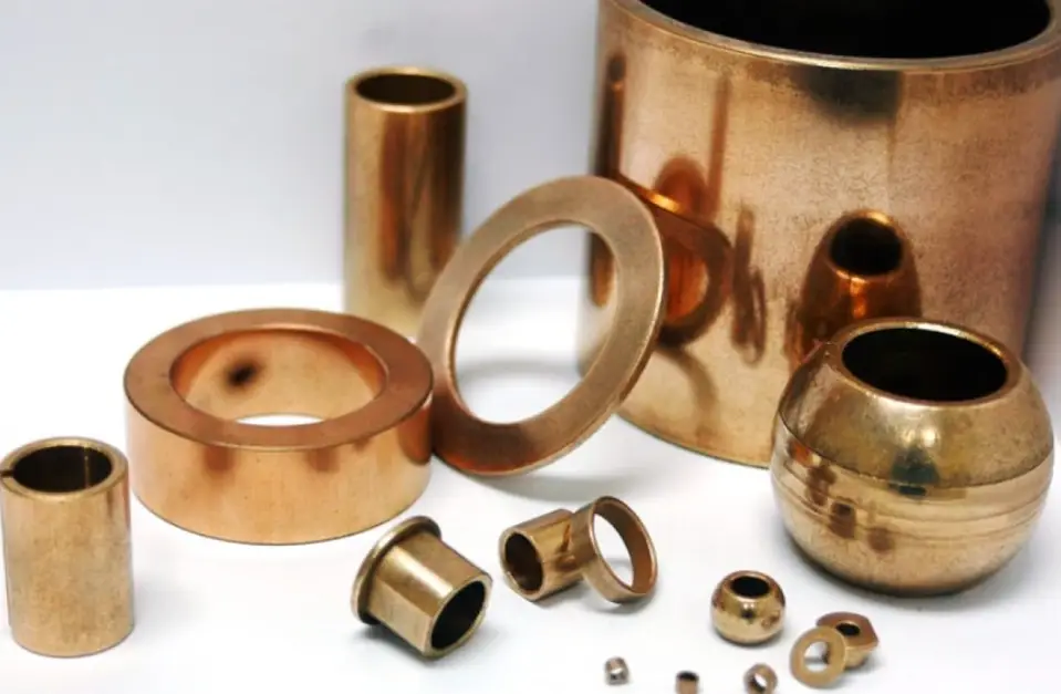 Different shiny brass products showcasing variety in size and design