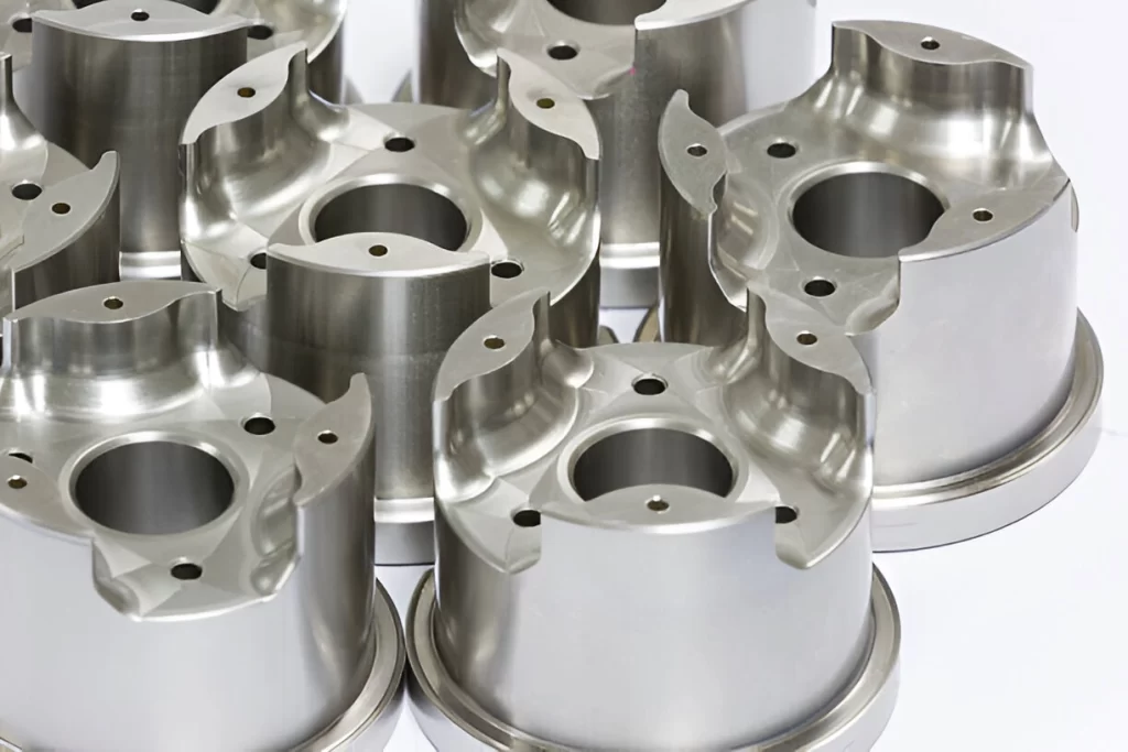 Completed design, CNC machined complex parts displayed.