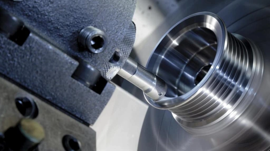A boring bar enlarging the hole with external threads