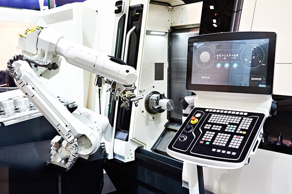 A CNC lathe with robotic arm