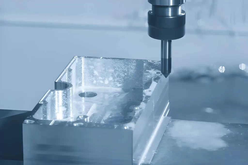 Aluminum component being machined on a CNC milling machine, showing cutting tools in action.