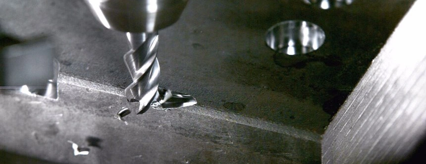 An close up view of milling tool failure and cracked section.