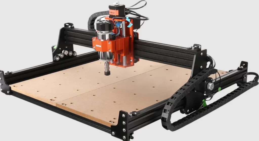A CNC router with an orange spindle head