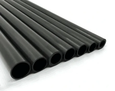 Black carbon fiber tubes arranged in a row for industrial or engineering use.