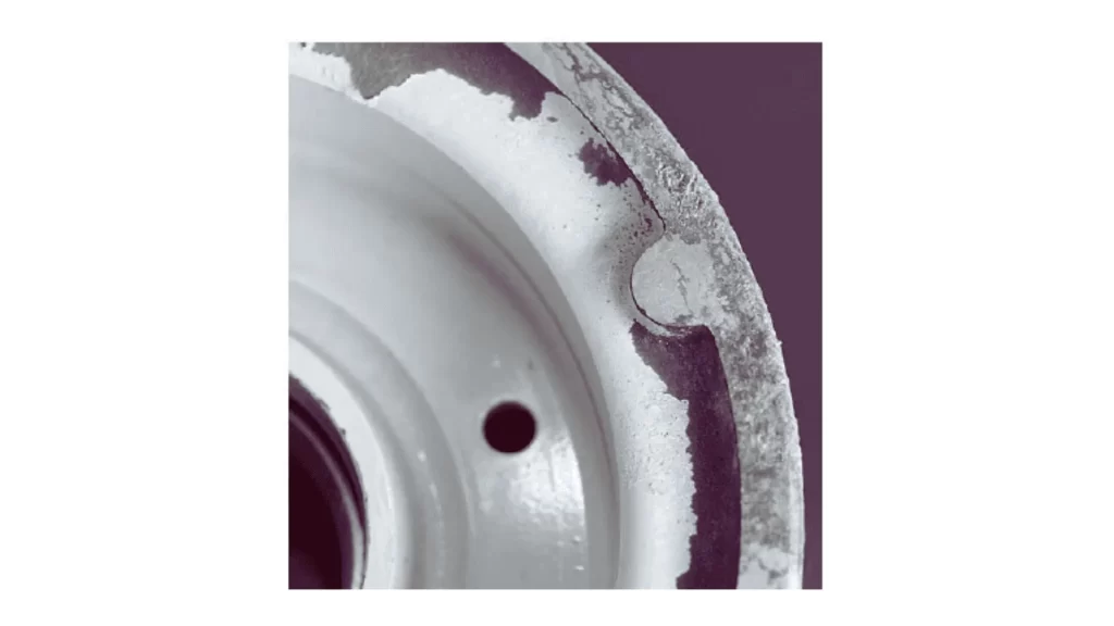 Magnesium component showing signs of corrosion damage