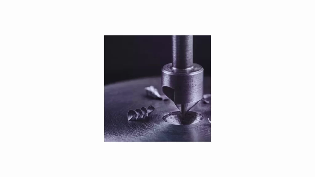 The image shows the drilling process of a countersink hole.