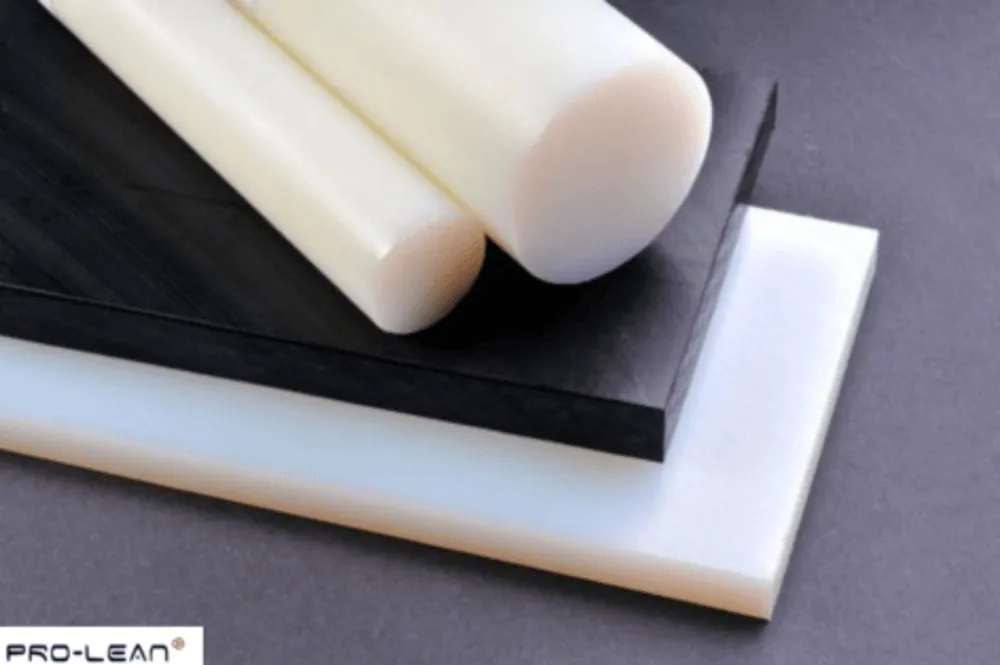 Black and white Delrin/Acetal rods and sheets highlighting material variations and forms.