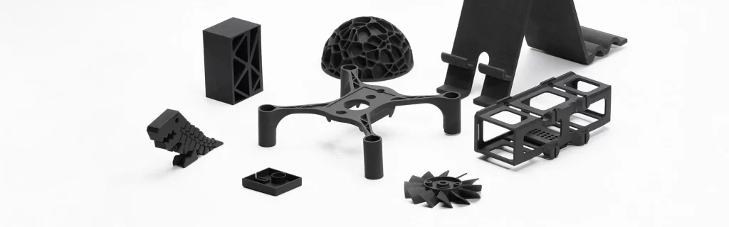 Black-colored drone parts from SLS, frame, arm, structural elements, etc.