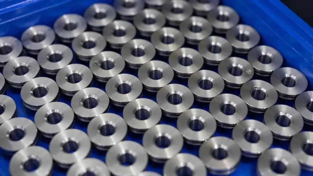 An image showing finished Aluminum 6061-T6 parts neatly arranged in a packaging box