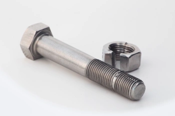 A pair of nut and bolt with galling on the thread