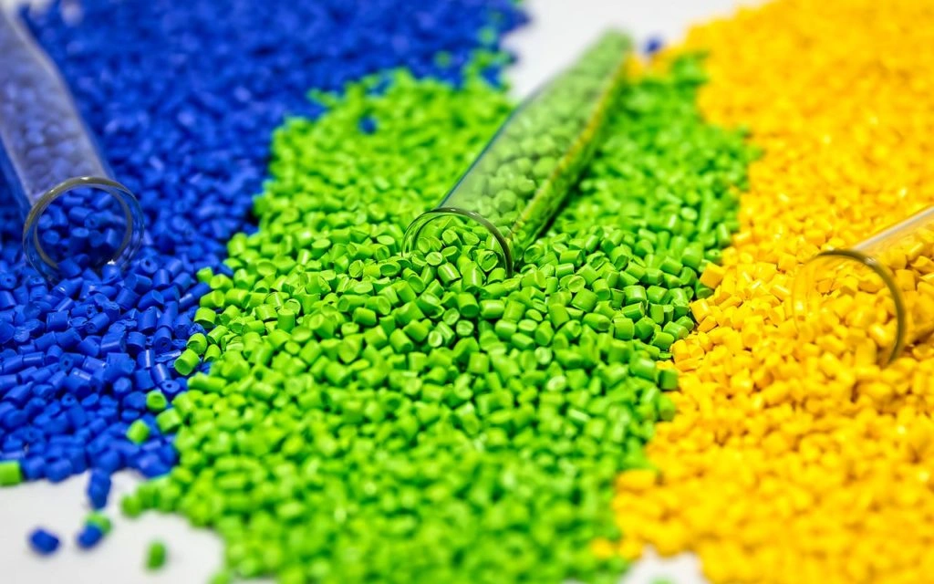 A close-up view of three different injection molding pallets