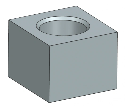 An image of a chamfered hole in a block of material