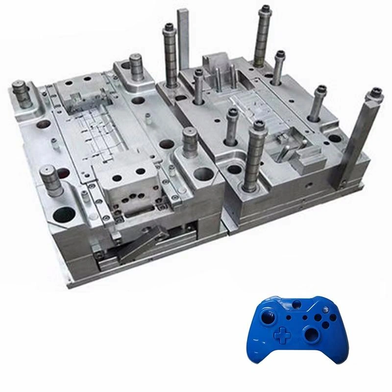 An open view of Mold for game controller housing and molding result