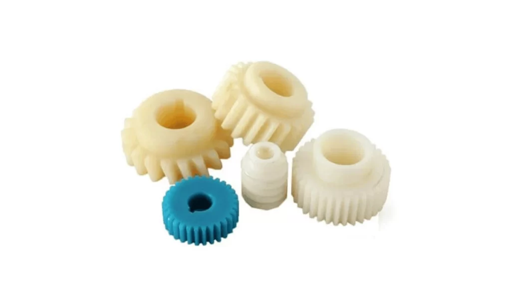 The image displays nylon prototypes in vibrant colours.