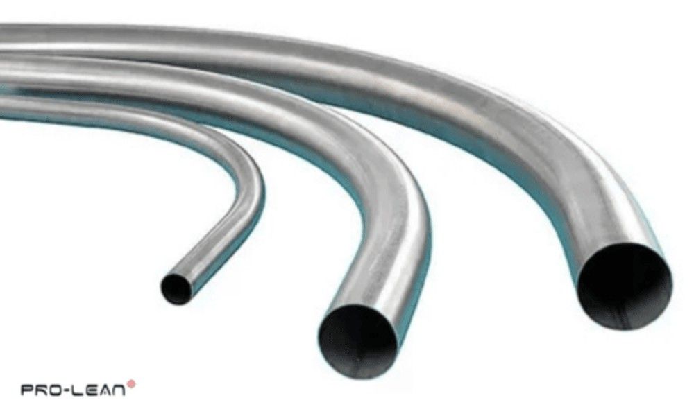 Three curved stainless steel pipes of varying diameters