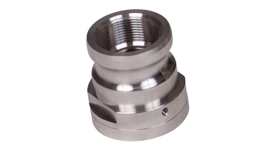 The image showcases a close-up of a precision-machined metal part. It highlights its fine details, smooth finish, and exact dimensions.