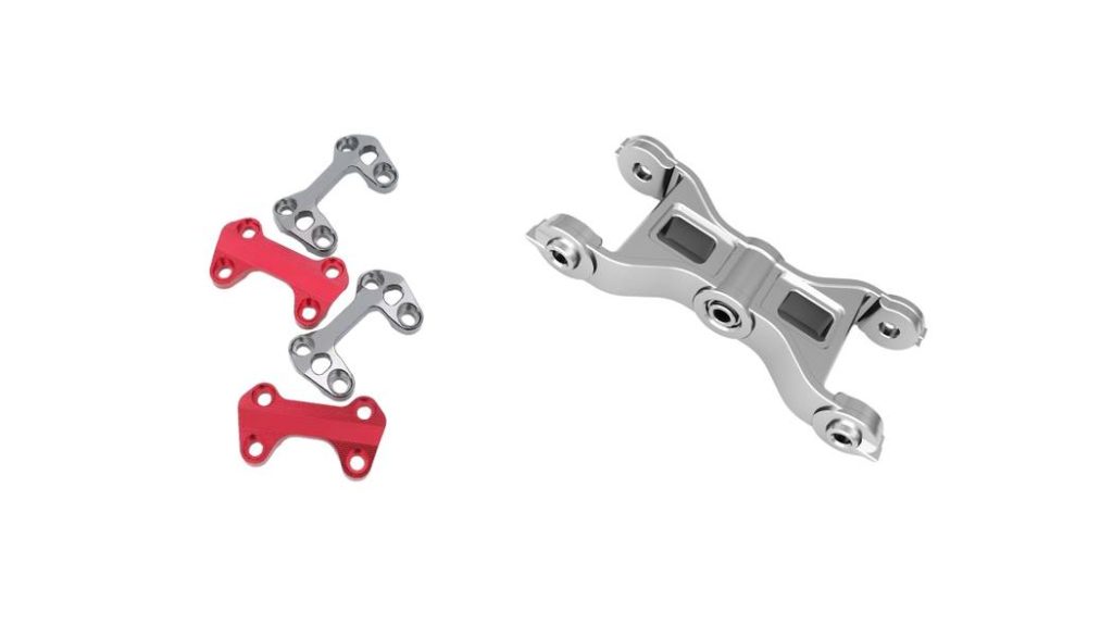 Small-bore 3D printed motorcycle parts showing compact design