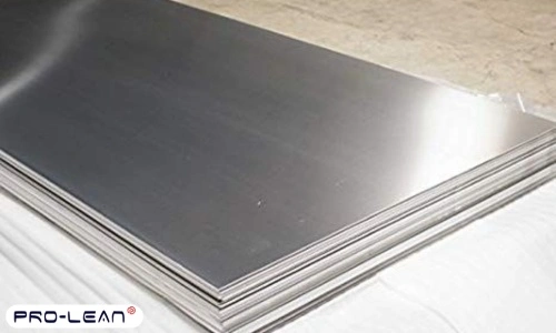 A stack of 430 stainless steel sheets with a smooth, reflective surface is placed on a white protective sheet