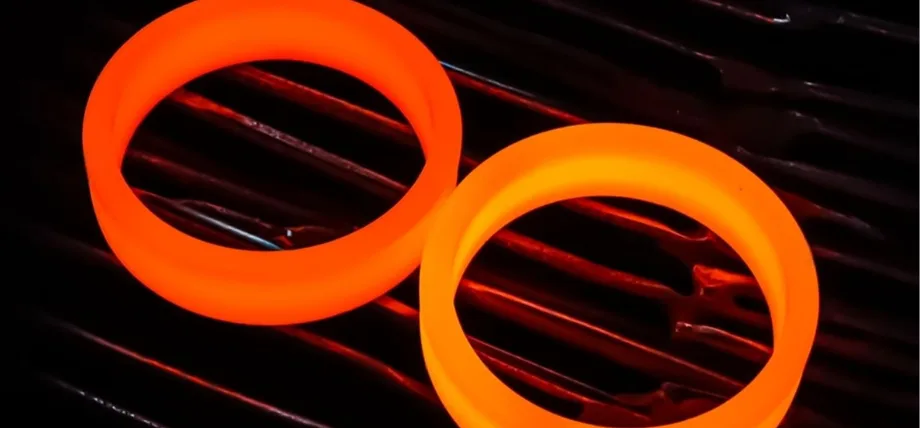 Steel rings glowing orange under heat
