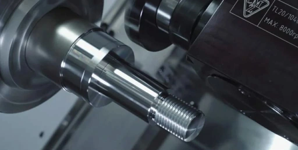 A close-up view of step turning, workpiece attached to the chuck