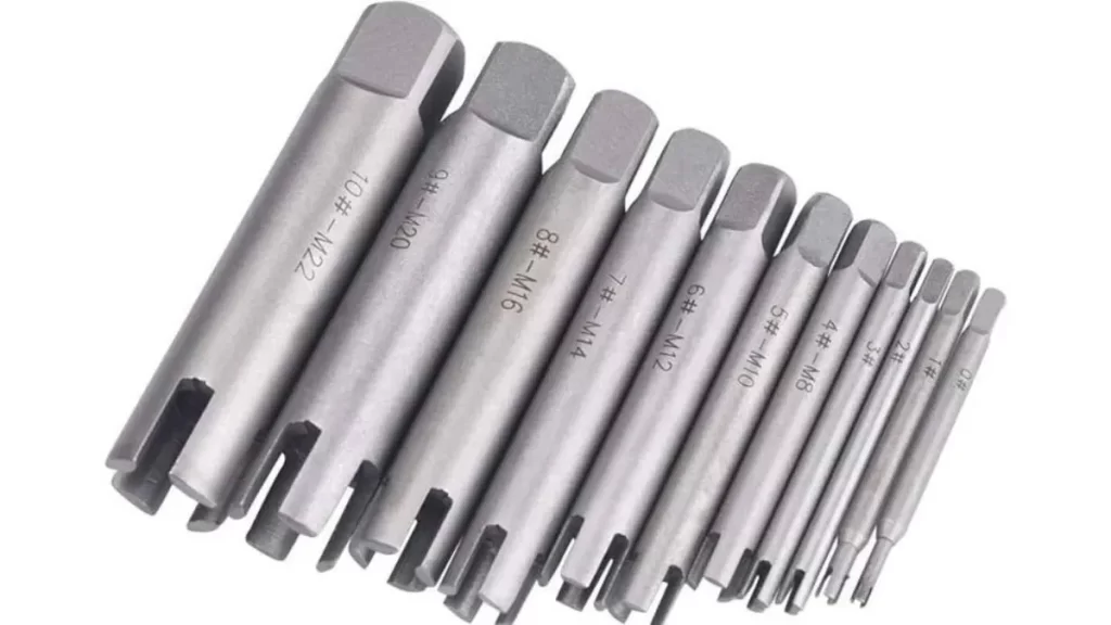 A close-up image of tap extractor tools in varying sizes, neatly arranged side by side.