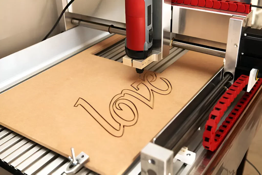 The word “Love” engraved on a wooden surface.