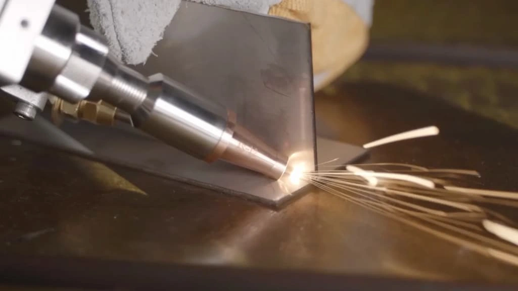 An image showing a laser welding machine joining the titanium parts