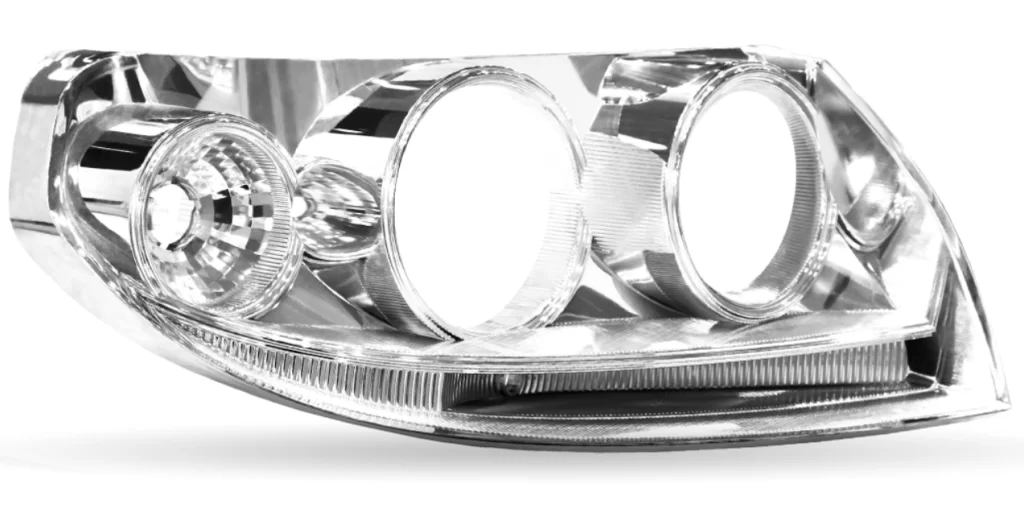 A closeup image of a vacuum-metalized car headlight