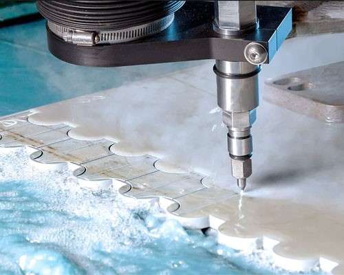 Waterjet cutting machine is cutting parts