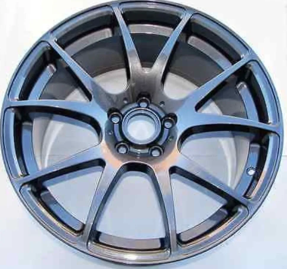 A greyish blue car rim with an acrylic coat