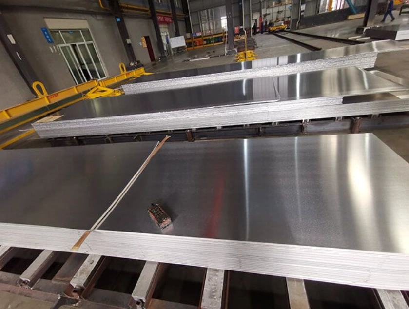 An image of several piles of aluminum grade sheets for aerospace in a factory