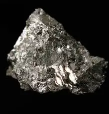 Shiny beryllium alloy piece showing metallic texture