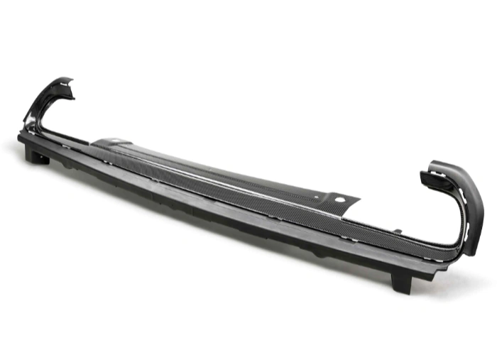 A black carbon fiber tail light lens surround