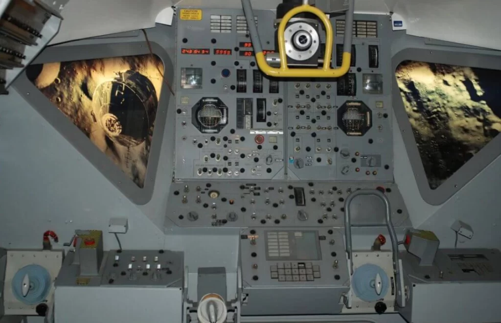 A closeup image of the inside of an aircraft showing various cockpit components