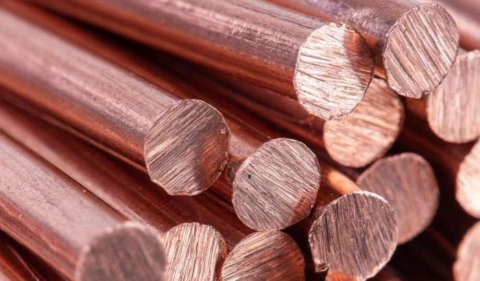 An image showing a pile of copper rods with roughly cut ends