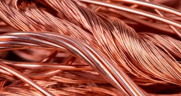 A closeup image of many interlinked electrical copper wires