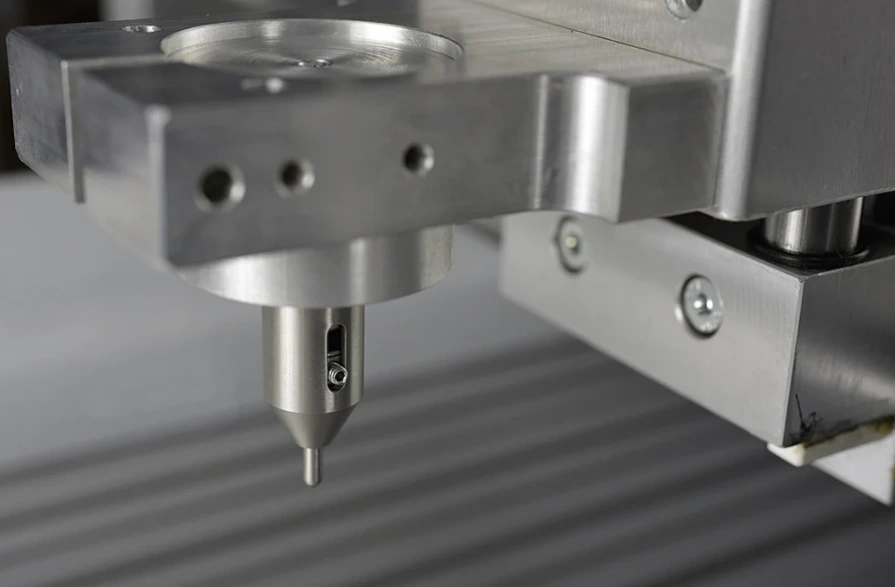A closeup showcasing a diamond tipped feature for diamond drag engraving