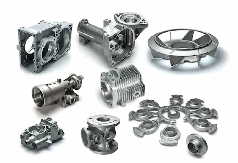 An image sowing various die casting parts, from automotive engine component to machinery hardware
