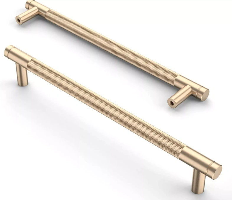 Two zinc alloy cabinet pulls with knurled textures and gold finish.