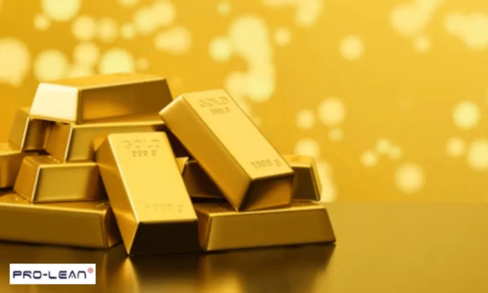 Stack of gold ingots representing a valuable metal alloy.