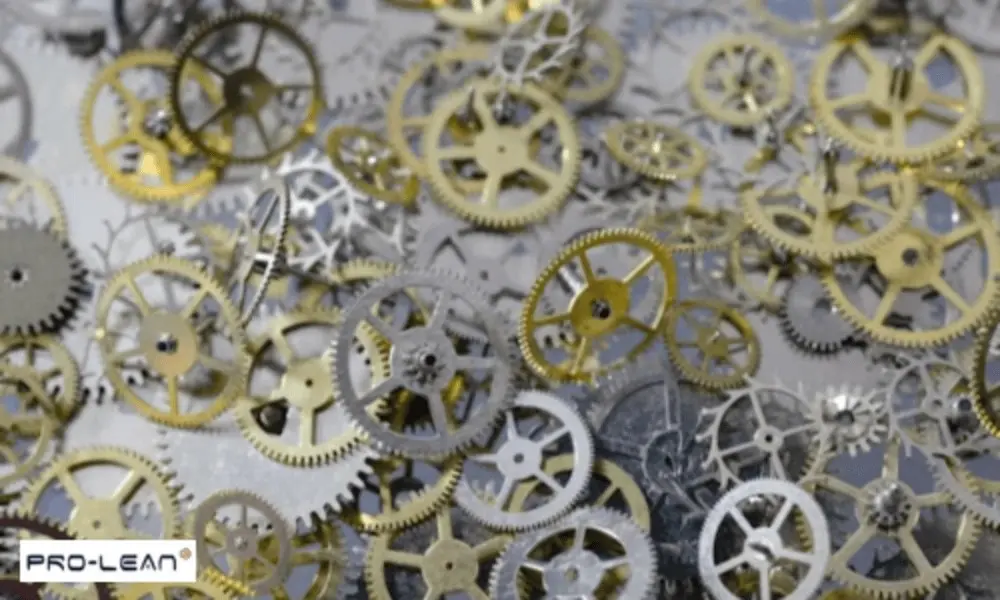 Close-up of numerous small, intricate alloy gears with their use in various industries.