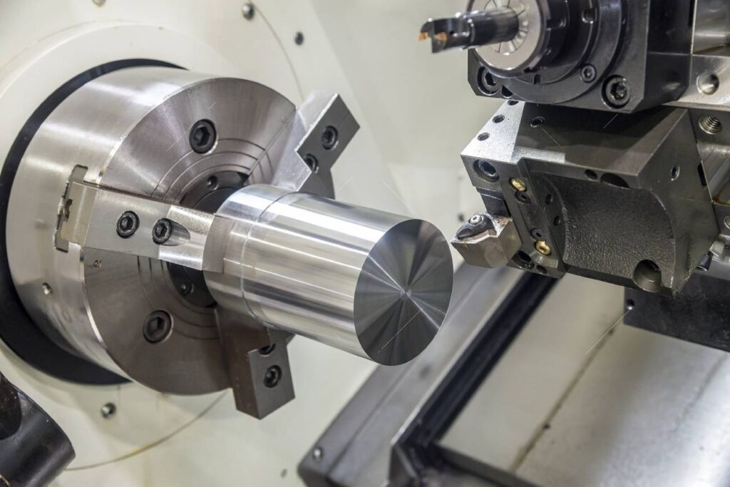 Close-up view of a mechanical clamping system used to firmly secure workpieces during machining.