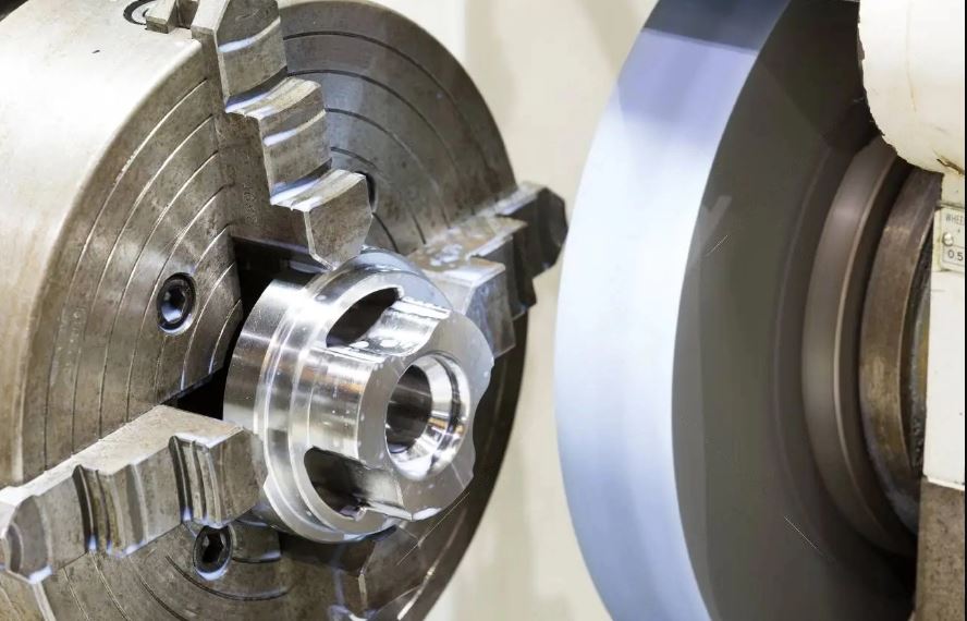 Precision grinding of an automotive part